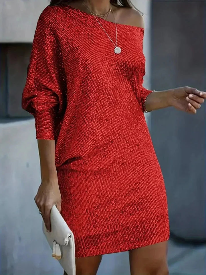 Red off-shoulder sequin party dress by Nyari, shimmering fabric with a sleek design perfect for a glamorous night out.