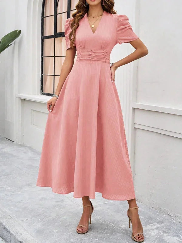 "Flowy midi dress with puff sleeves and a V-neck design in a lightweight fabric - Carson dress"