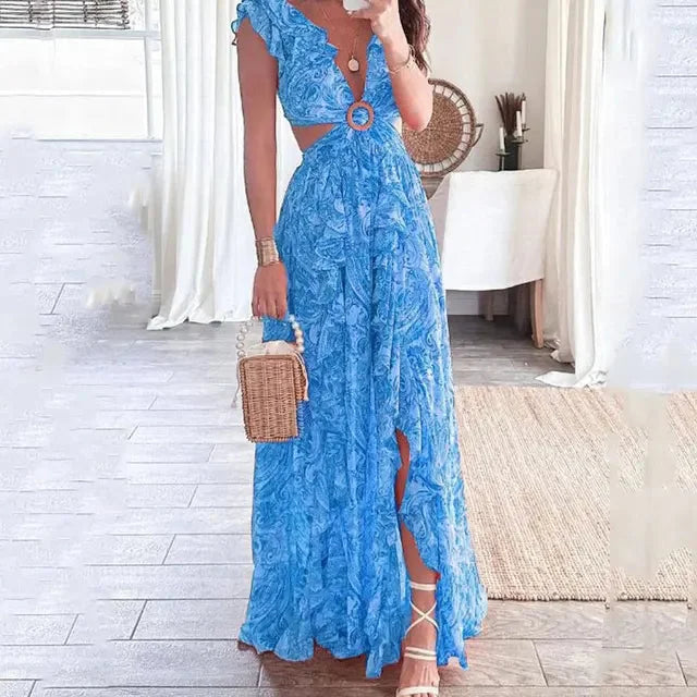Blue floral V-neck maxi dress by Lilibeth, featuring a flowy design with floral patterning, made of soft, comfortable material.