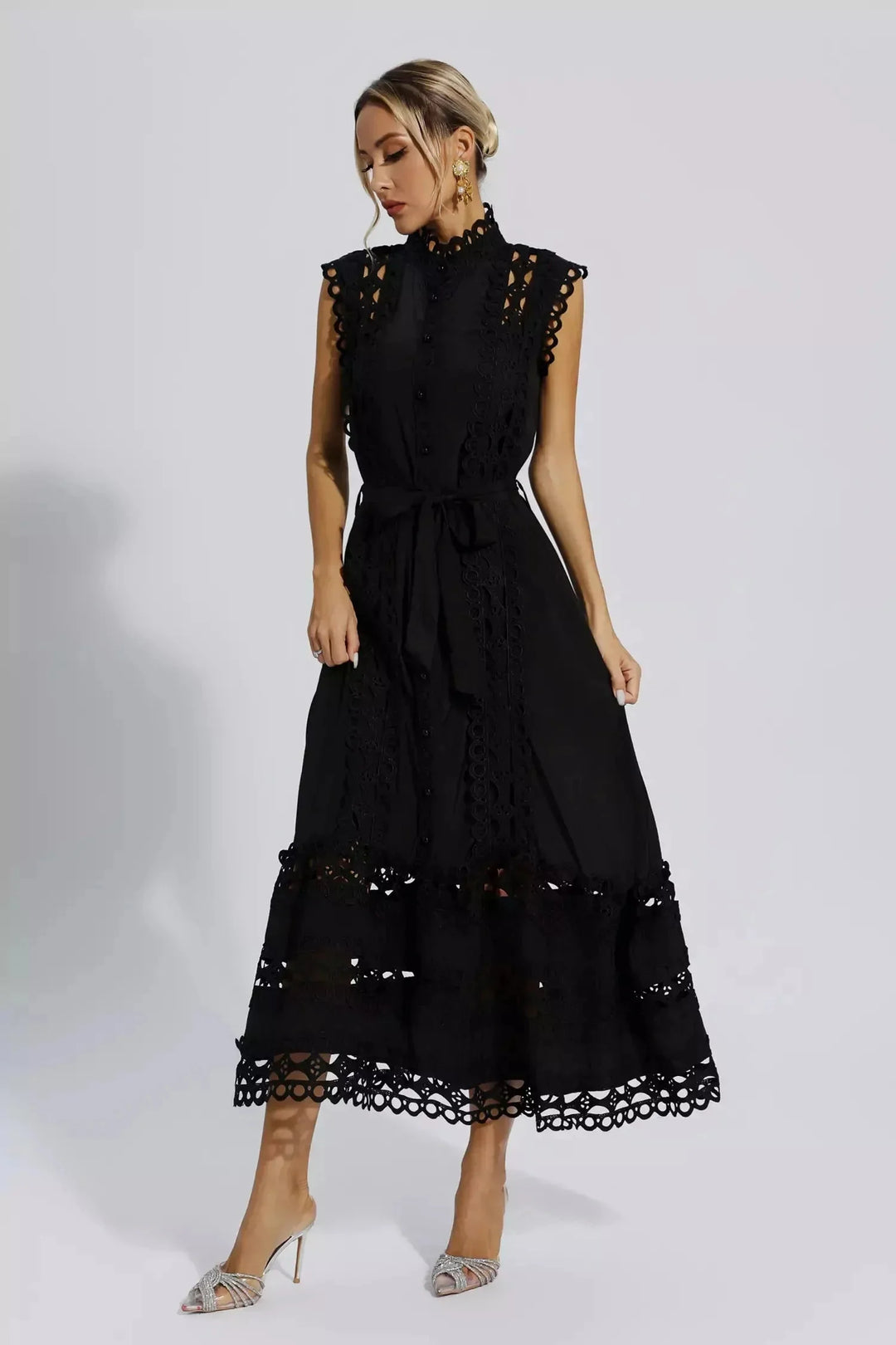 Zya sleeveless lace midi dress with belted waist in a charming design featuring intricate lace details and a flattering…