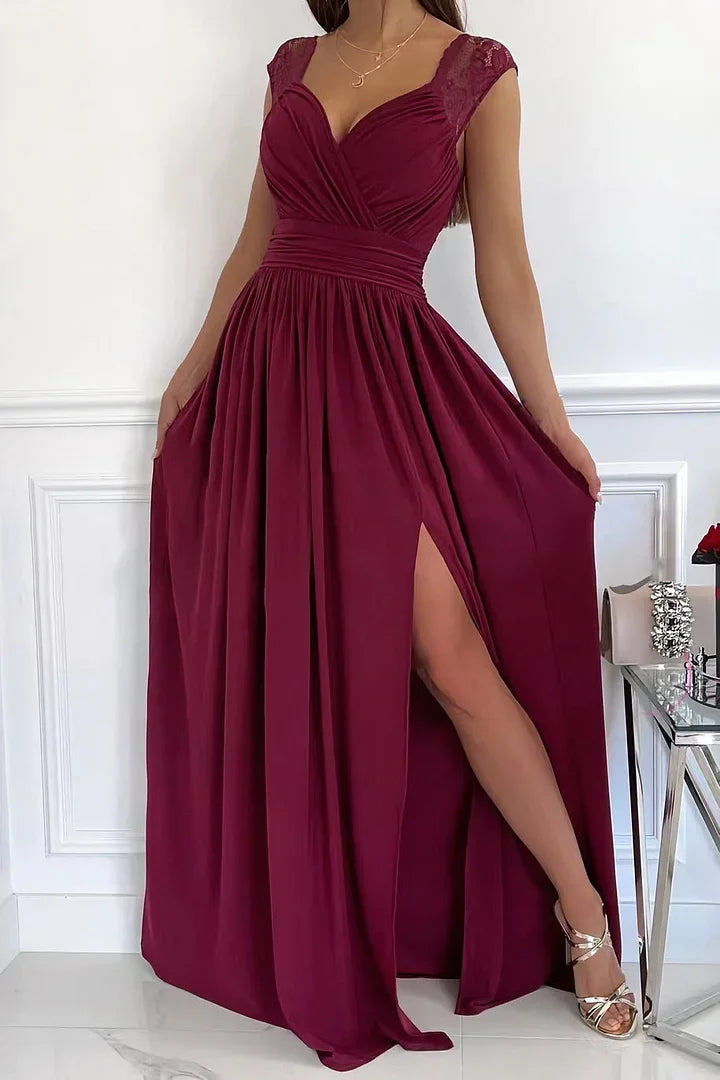 Brown lace maxi dress with slit designed by Wrenna, sleeveless and elegant.