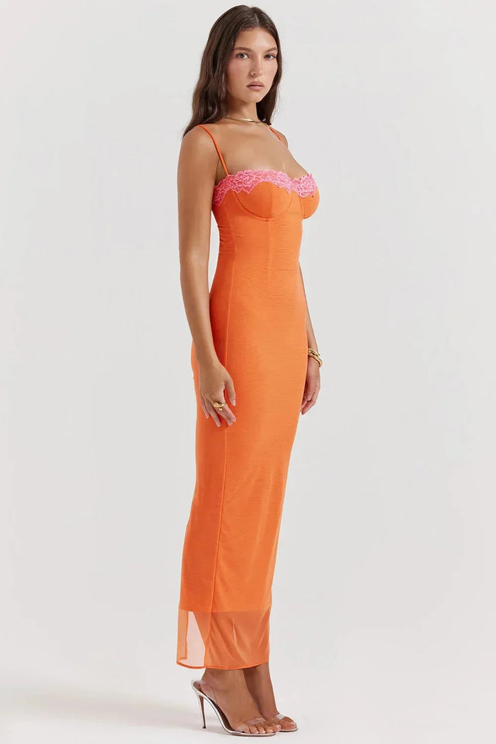 "Stevi floral maxi dress with adjustable straps, featuring a vibrant floral design on soft and lightweight fabric."