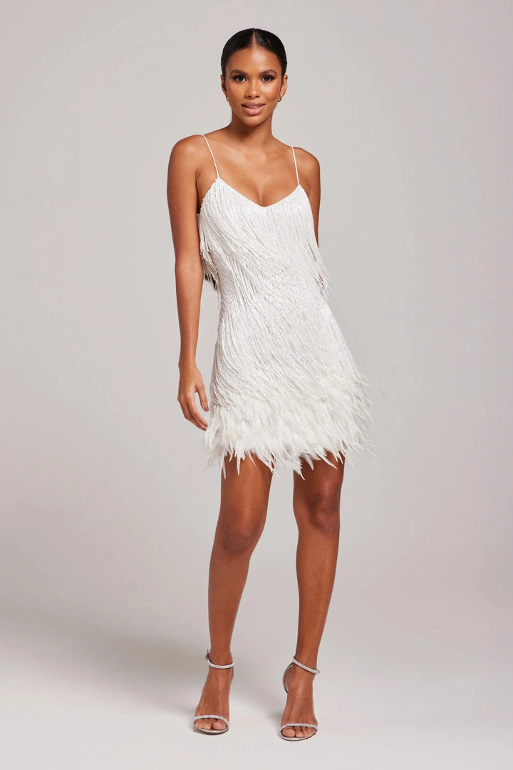 Black feathered mini dress with adjustable straps by Bostyn. Flattering design perfect for a night out or special occasion.