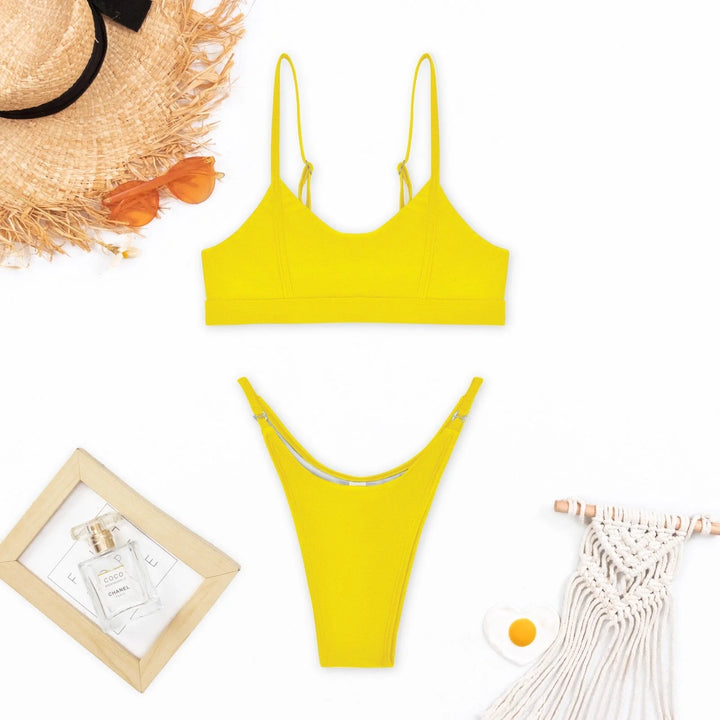 Yellow push-up bikini with adjustable straps and sleek design for optimal fit. Made with high-quality, stretchy fabric for…