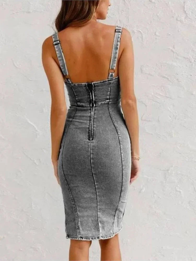 "Navee denim midi dress in a sleek fit. Featuring a flattering silhouette with classic denim detailing."