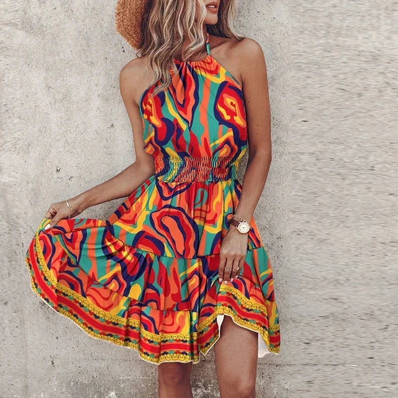 Orange halter neck mini dress with a vibrant design. Features a flattering silhouette and made of high-quality fabric.