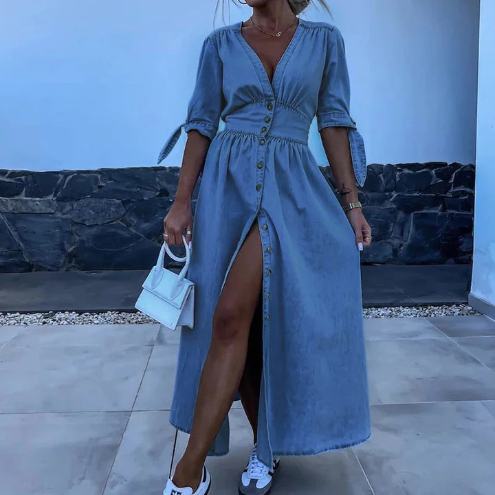 "Denim dress with button-front detail and tie sleeves from Mariam, perfect for casual chic looks."