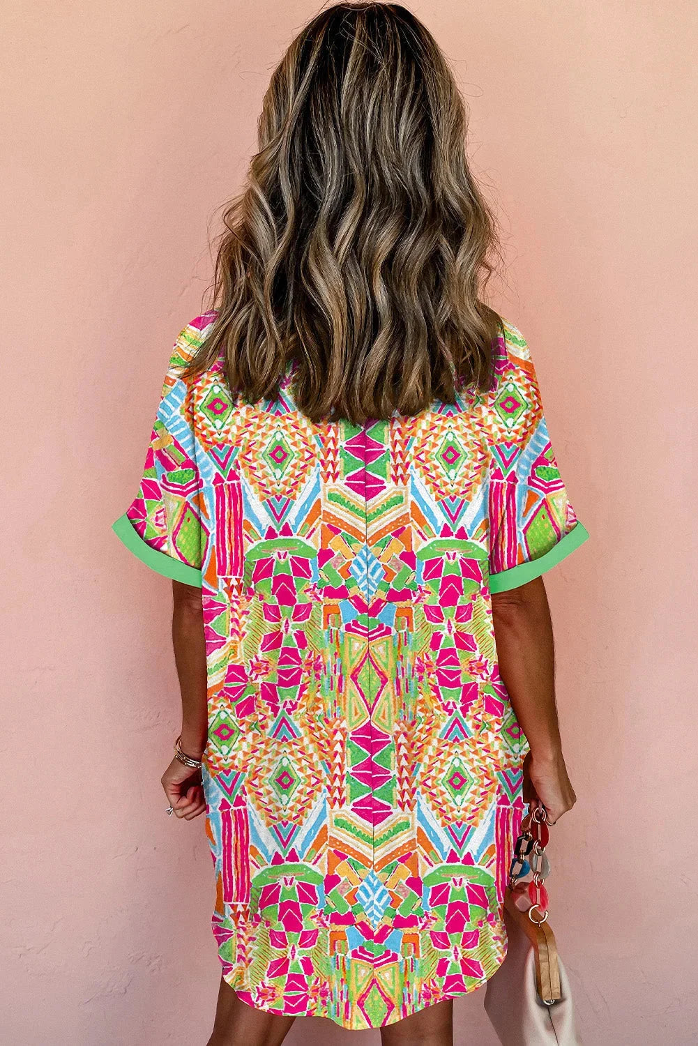 "Blessyn shirt dress featuring vibrant colors with button-down detail, perfect for casual outings or everyday wear."