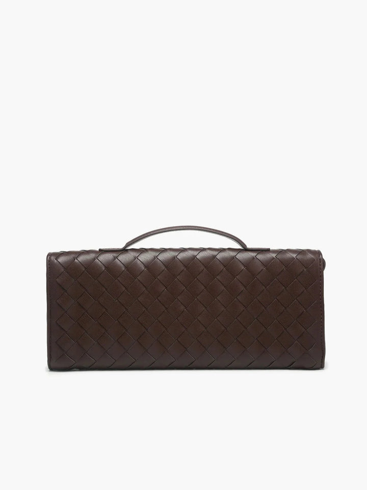 Black quilted shoulder bag with Tierney clasp closure, ideal for casual or formal outfits. Made of durable and stylish material.