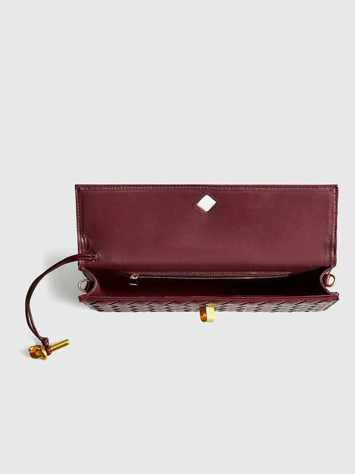 "Tierney shoulder bag with quilted design, secure clasp, and a versatile strap for effortless styling."