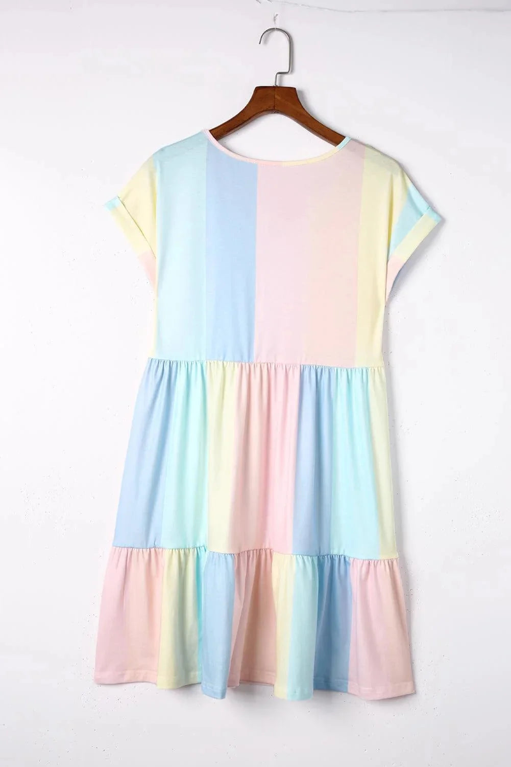 "Brynna pastel mini dress with flutter sleeves, featuring a soft and flowy fabric in a delicate pastel color palette."