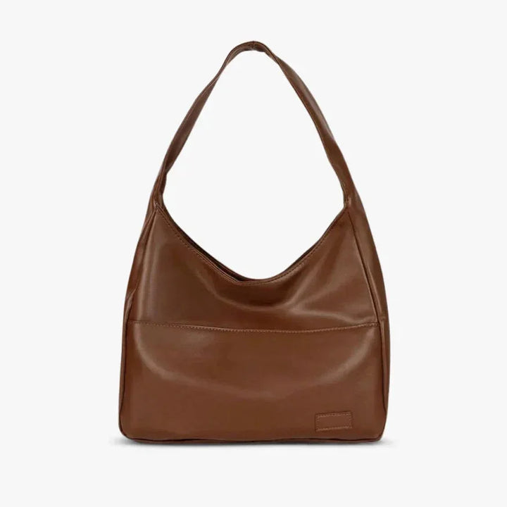 Brown shoulder bag with a modern and sleek design, featuring a durable and stylish material for everyday use.