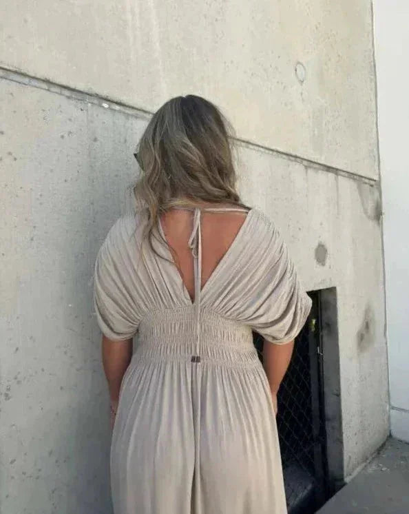 "Amaya maxi dress in flowy fabric, with elastic waist and a relaxed fit, perfect for effortless style and comfort."
