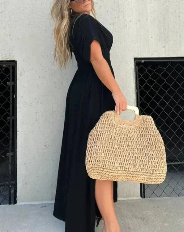 Flowy maxi dress with an elastic waist named Amaya, featuring a light and airy design perfect for casual and relaxed…