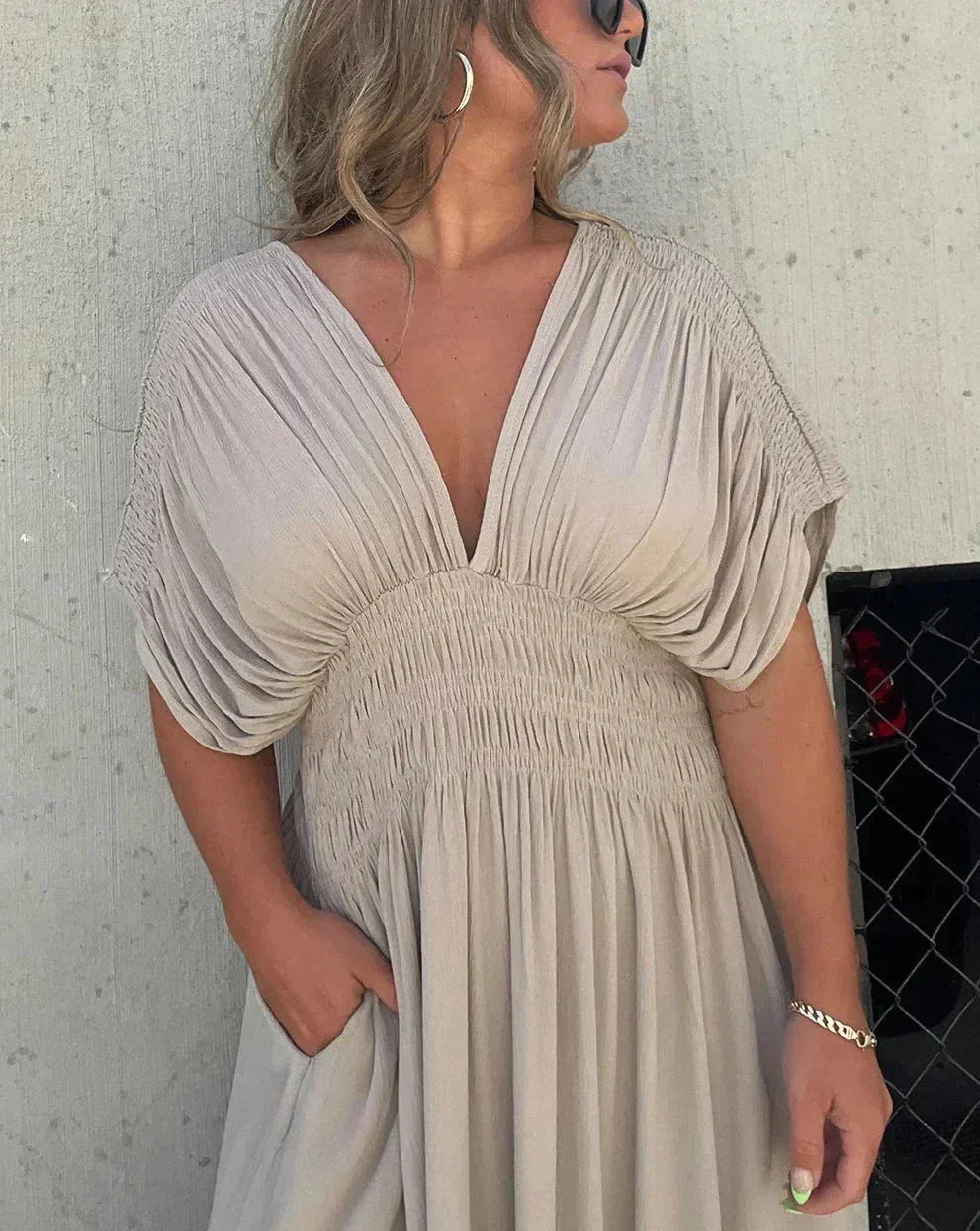 "Amaya maxi dress in comfortable flowy fabric with elastic waist, perfect for casual and formal occasions."