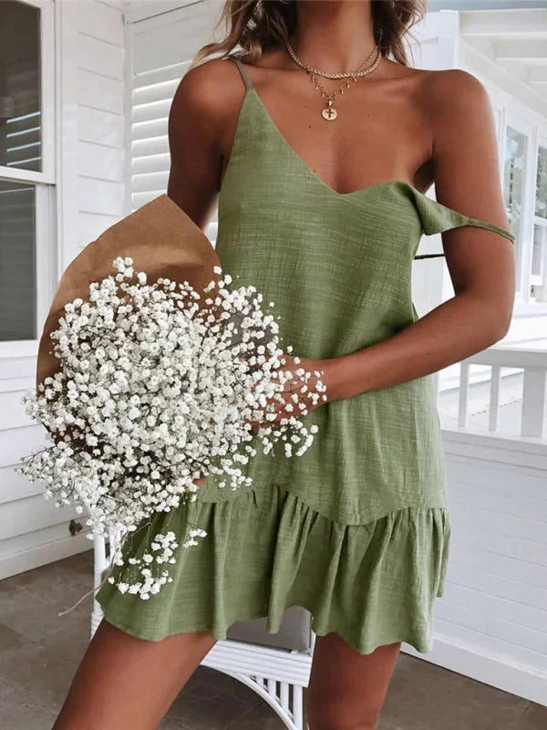 "Green strappy V-neck dress with ruffled detail by Calani, made from lightweight and flowy fabric for a feminine and…