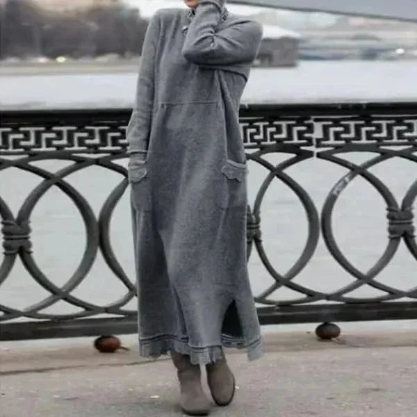 Ankle-length winter attire named Carina, featuring a cozy design ideal for cold weather.