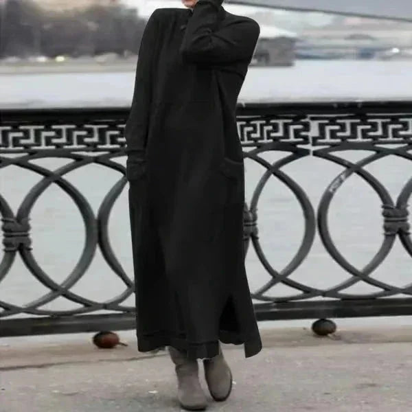 Ankle-length black winter attire from Carina with cozy, warm fabric and ribbed design, perfect for staying stylish and…
