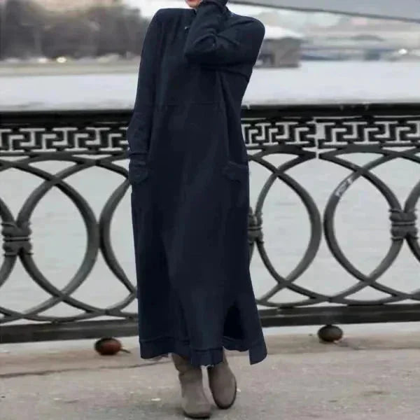 Blue ankle-length winter attire named Carina, showcasing a cozy design perfect for colder months.