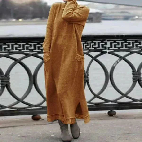 Orange ankle-length winter attire in soft knit fabric with ribbed cuffs and cozy design by Carina.