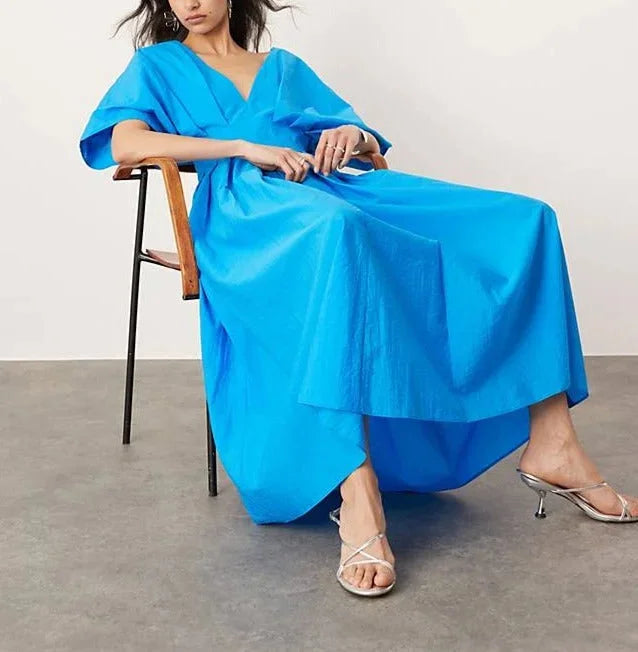 Justine midi dress in vibrant blue, V-neck, kimono sleeves. Made of soft and breathable fabric, perfect for casual or formal…