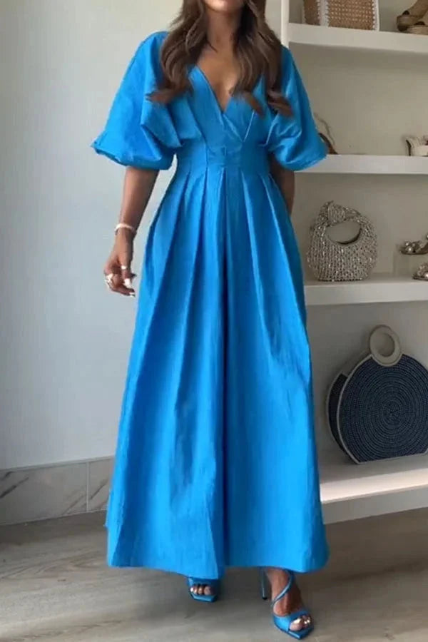 "Justine midi dress in vibrant blue with v-neck and kimono sleeves, perfect for a stylish and comfortable casual look."