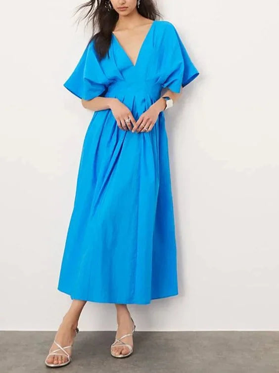 Justine vibrant blue midi dress with V-neck, kimono sleeves, in soft and breathable fabric.