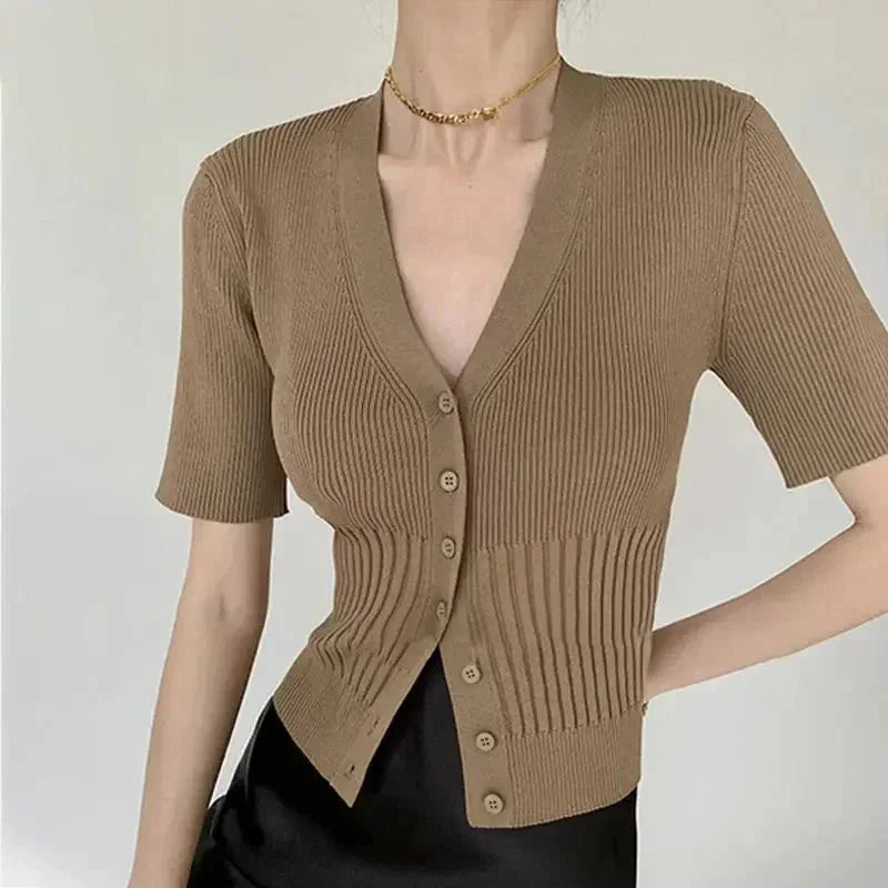 Talitha knit cardigan in Kafe, a fitted silhouette with button details. Crafted from soft and comfortable knit material.