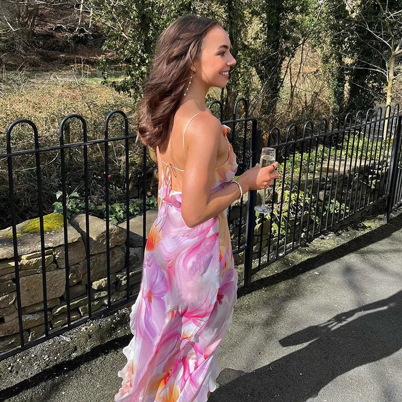 Sleeveless floral maxi dress by Viktoria with ruffle trim, a perfect blend of elegance and style.