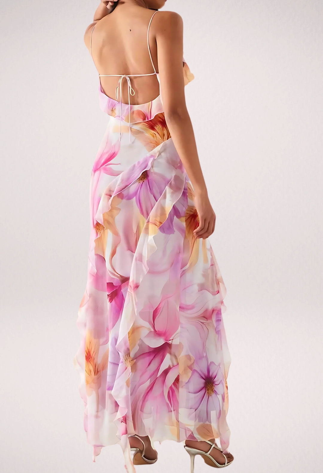 "Sleeveless floral maxi dress by Viktoria with ruffle trim, perfect for a casual chic look."