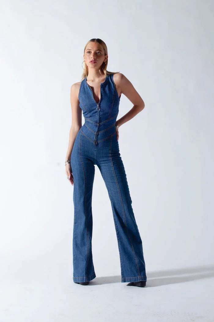 Sleeveless blue denim jumpsuit with zipper, featuring playful design and comfortable material for a stylish casual look.