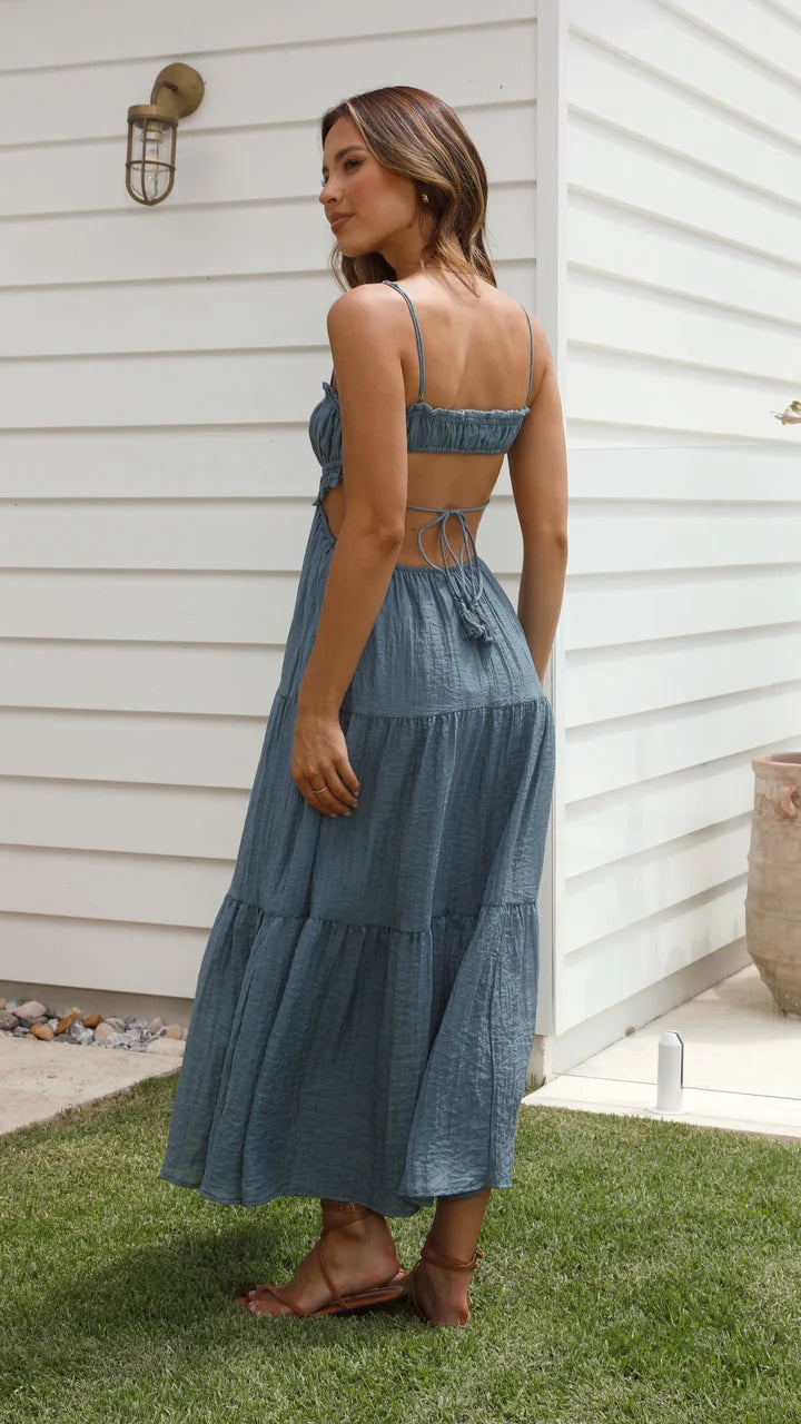 Women's tiered drawstring maxi dress in soft cotton blend fabric with a boho-chic style, featuring a flattering silhouette…