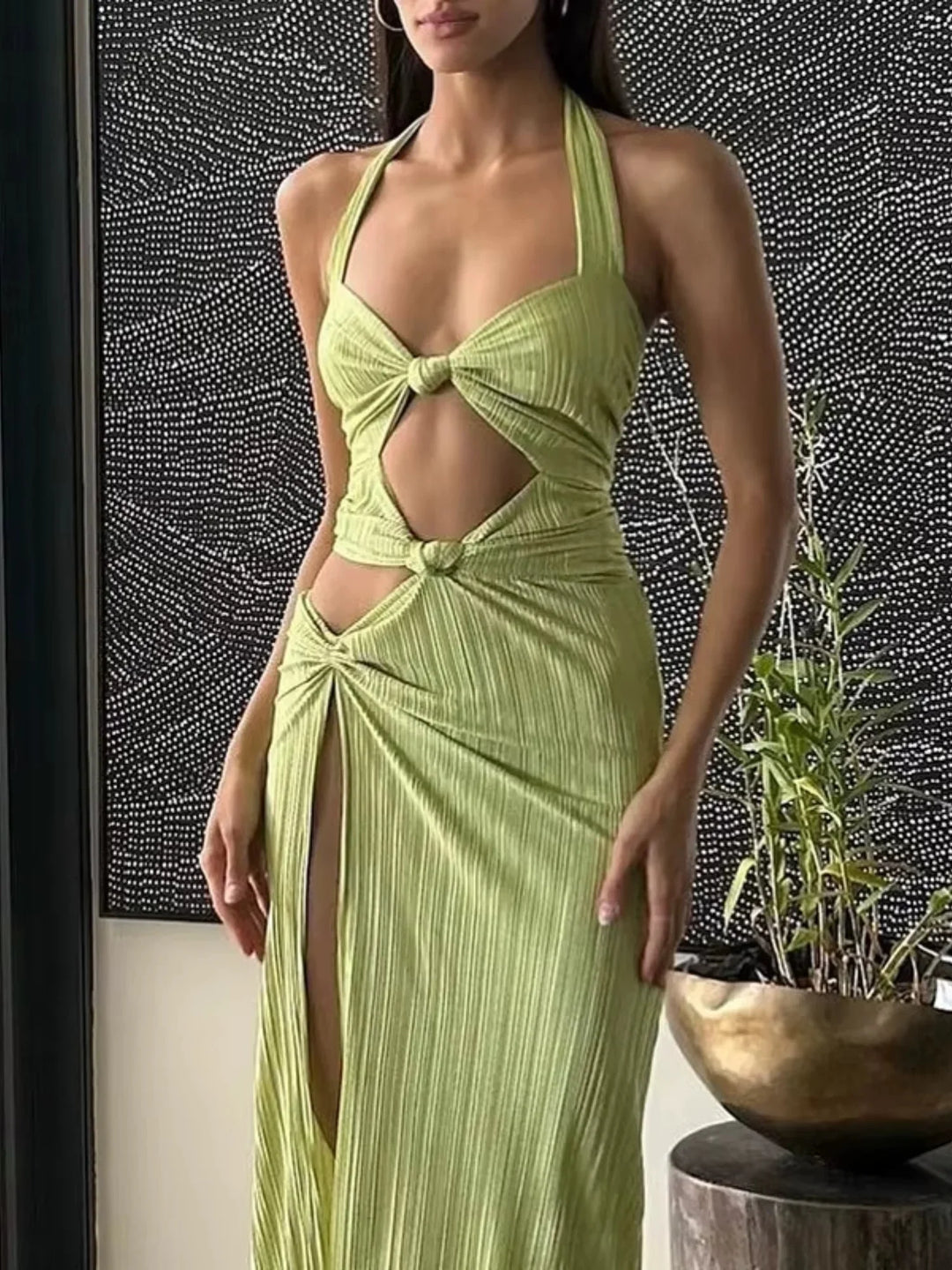 "Heavenly lime green maxi dress with slit, crafted in lightweight chiffon fabric, perfect for a breezy and stylish look."