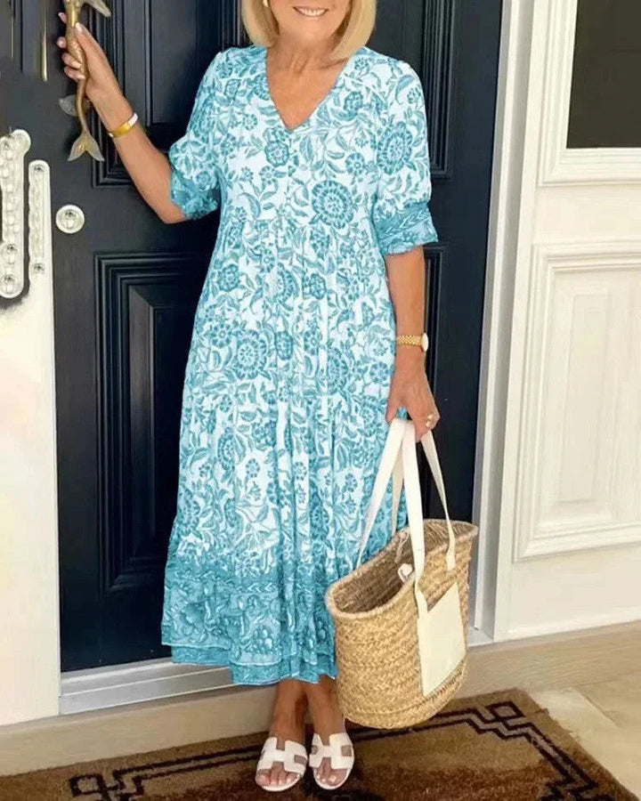 Light blue v-neck dress with tapered sleeves by Aylla. Made of soft, breathable fabric. Simple yet stylish design for…