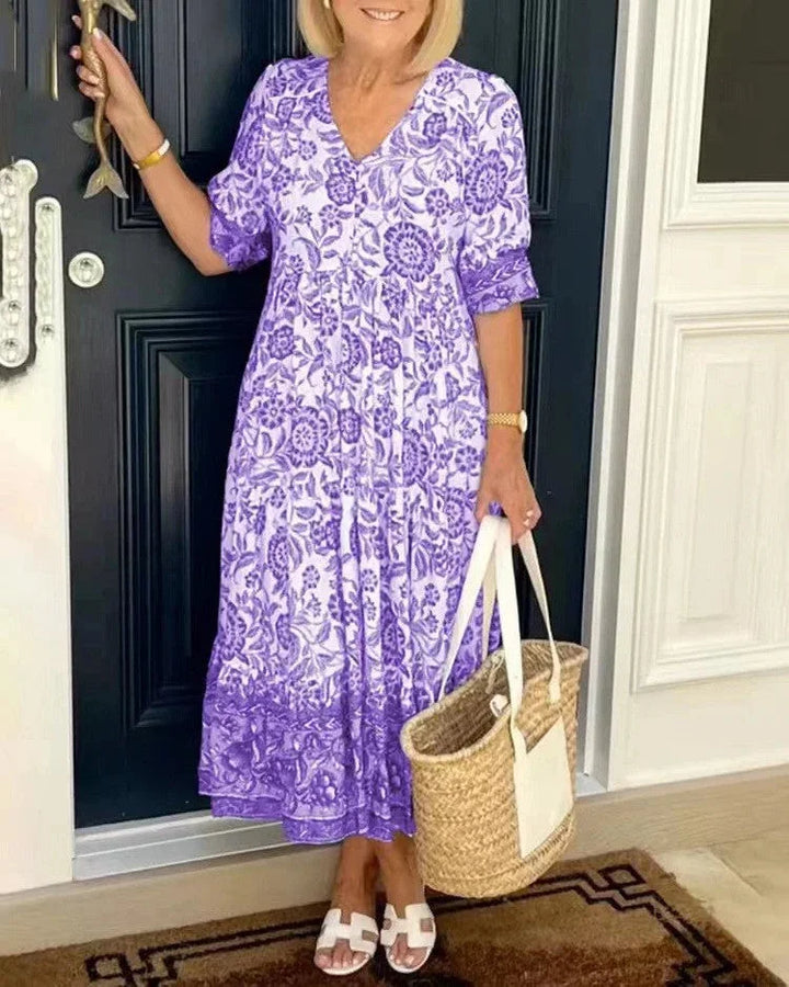 Purple V-neck dress with tapered sleeves by Aylla. Made of soft, flowy fabric, perfect for stylish and comfortable everyday…