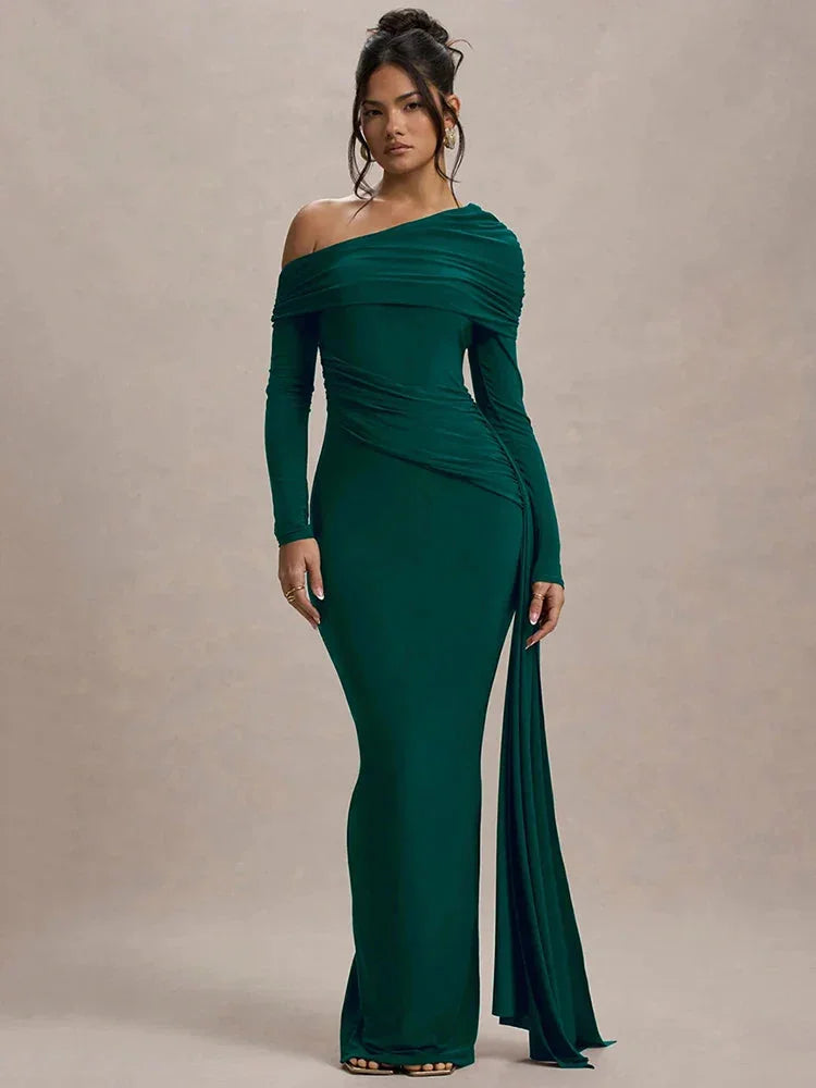 Off-shoulder Shelby-hued top with a draped silhouette.