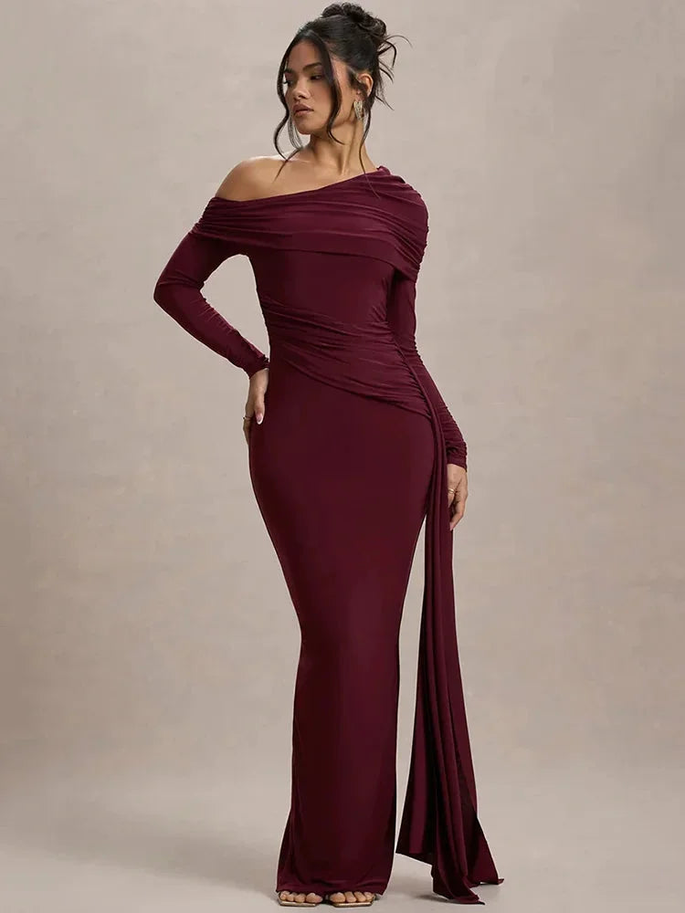 "Off-shoulder draped Shelby top with elegant design, made of high-quality fabric."