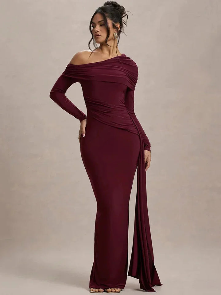 "Off-shoulder draped Shelby top with elegant design, made of high-quality fabric."