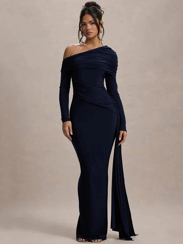 Off-shoulder draped Shelby dress with an elegant design, showcasing a rich Shelby hue and intricate detailing.