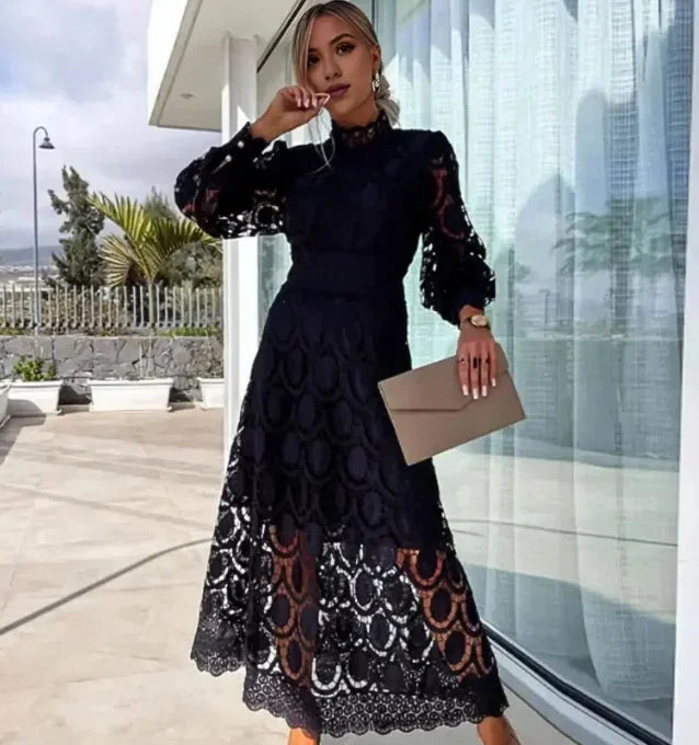 Adelynne midi dress with full sleeves, featuring elegant lace design.