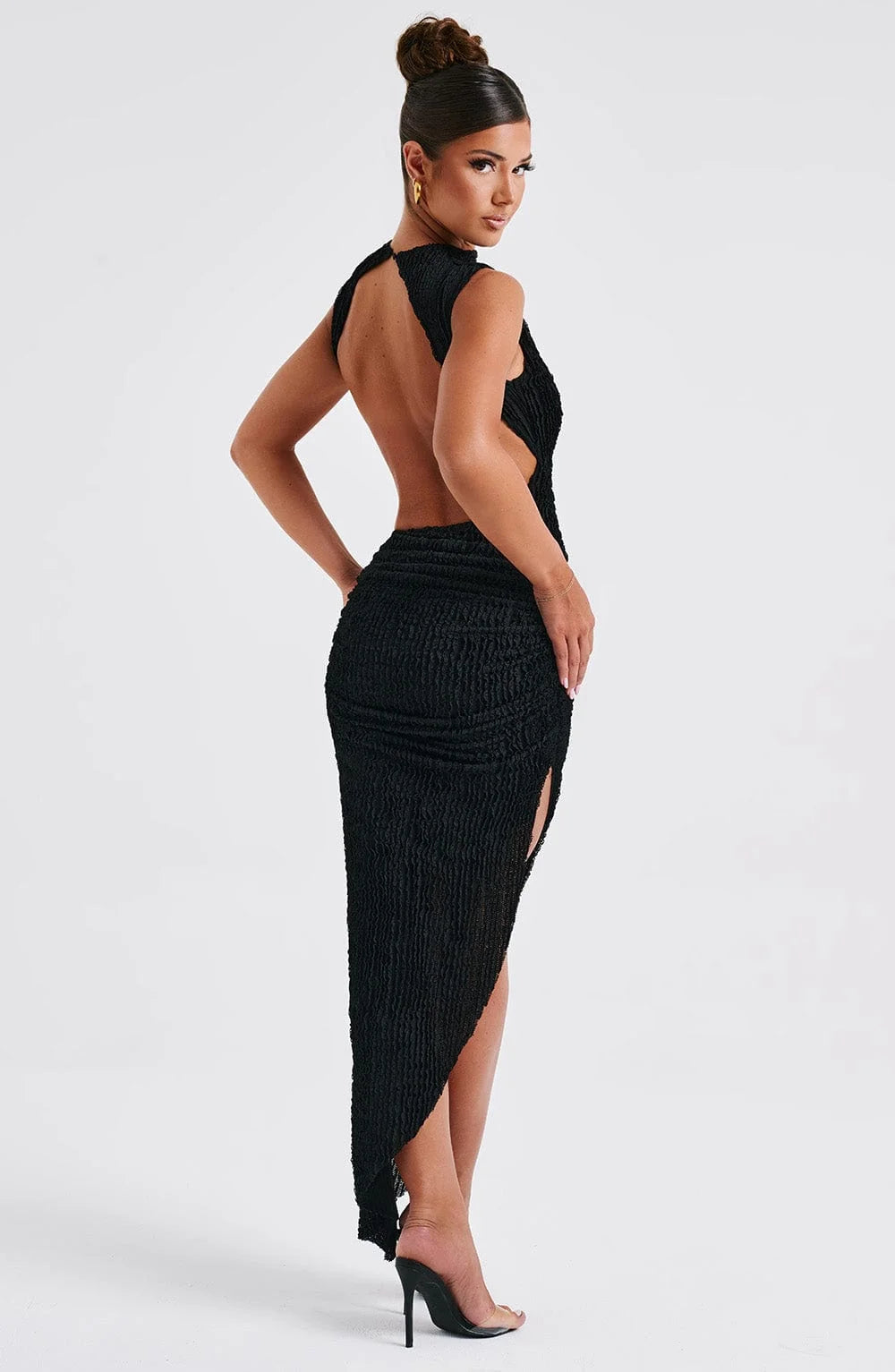 "Ayala sleeveless maxi dress in textured fabric with unique side cut-out detail"