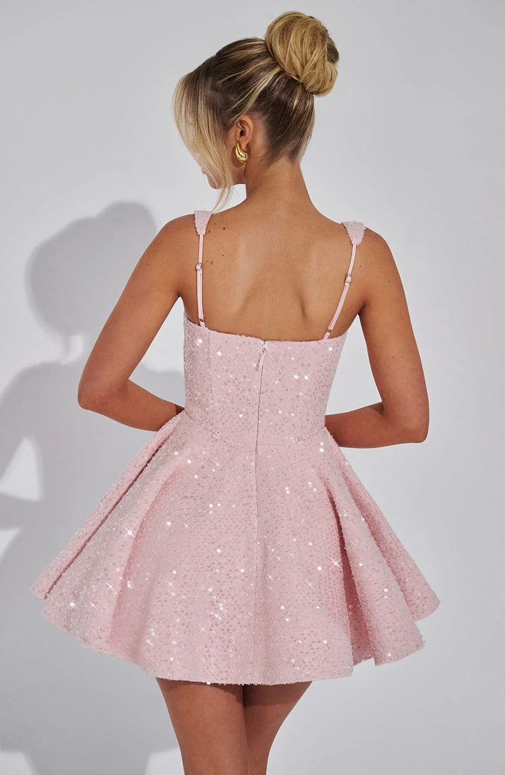 "Abigale fit and flare mini dress with sparkling metallic detailing, perfect for an elegant evening out."