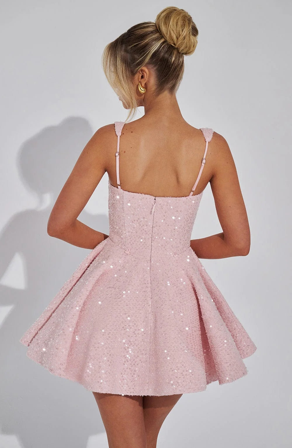 "Abigale Sparkling fit and flare mini dress in Stormy sequin material with plunging neckline and open back, perfect for…