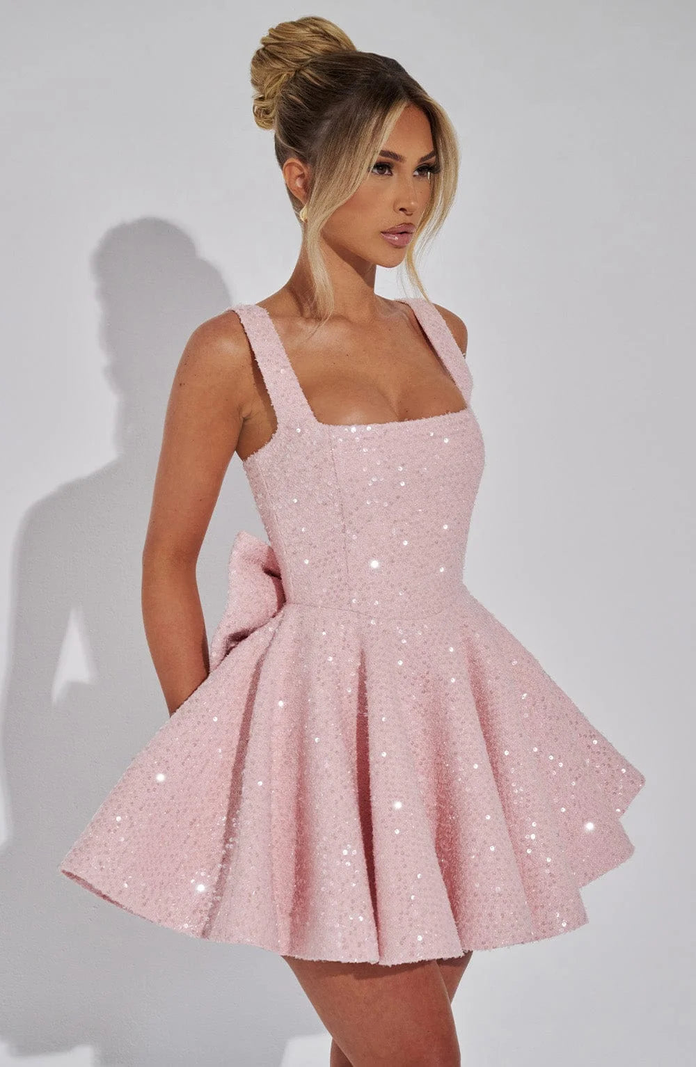"Abigale dress: Stunning fit and flare mini with sparkling sequins, perfect for a night out or special event."