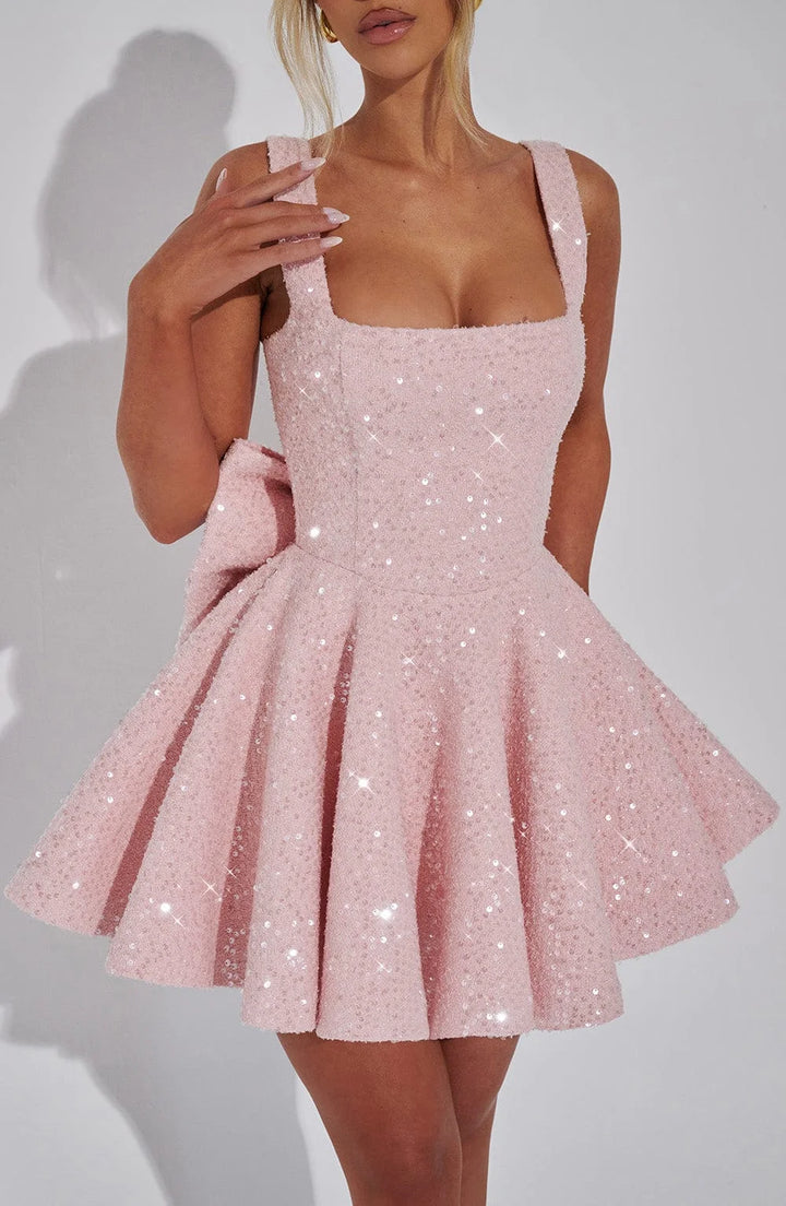 Abigale fit and flare mini dress in sparkling fabric with V-neck and spaghetti straps in Stormy color.