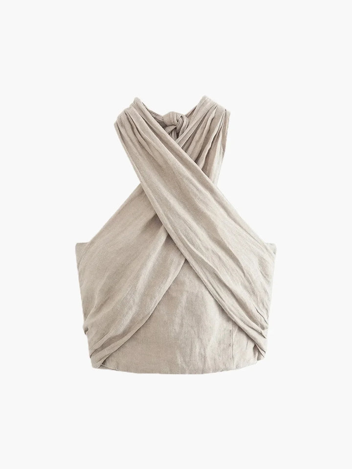 "Wisdom halter top in chic design, perfect for summer. Made of lightweight breathable fabric with a sophisticated touch."