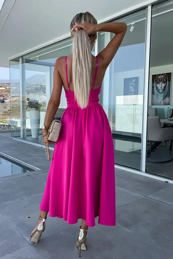 Alt text: "Mayli midi dress in soft fabric with trendy cut-out detail, featuring practical pockets. Perfect for a casual…