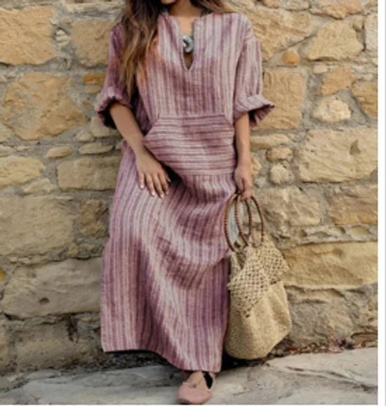 "Striped V-neck maxi dress in soft cotton blend with convenient pockets in Macy collection by [brand]."
