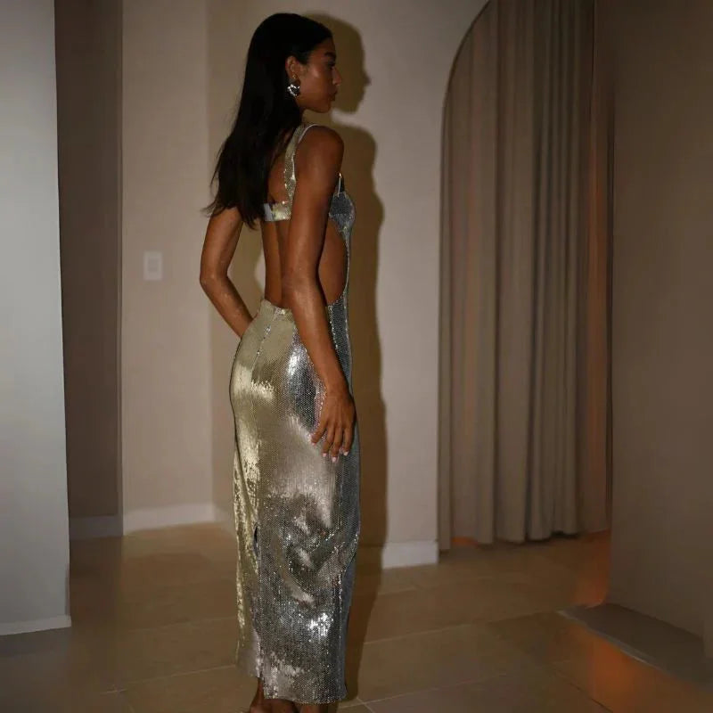 Gorgeous floor-length dress with shimmering sequins in a unique elegant design named Malka.