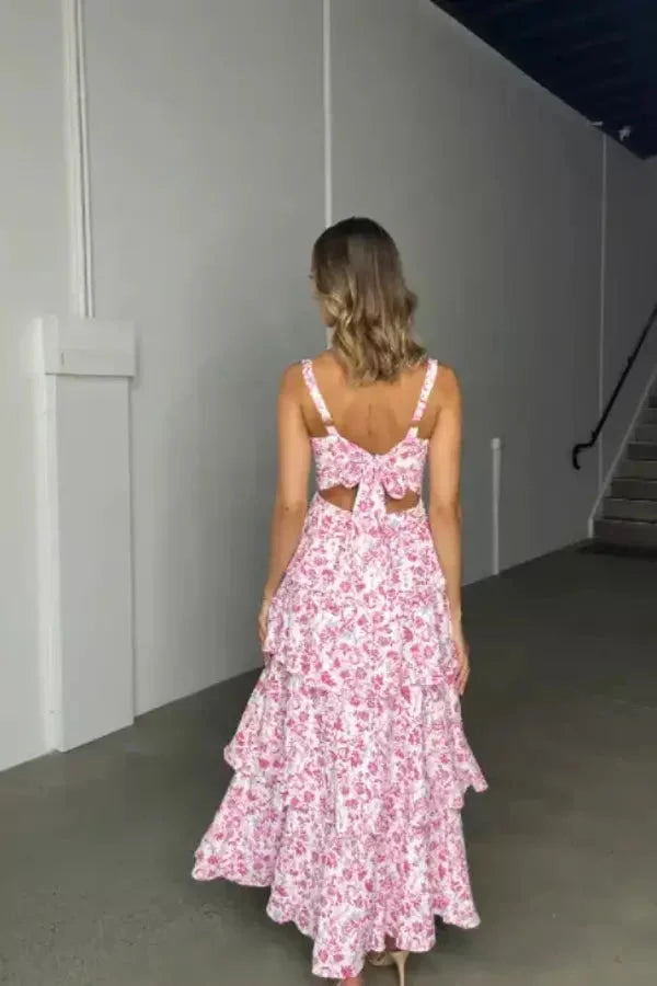 Stormy strapless dress with three-tier floral design, perfect for special occasions.